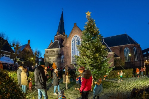 Kerstboom ontsteken